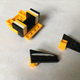 The white stripe on the wing was made by cutting a sliver out of the border of a Lego sticker sheet.